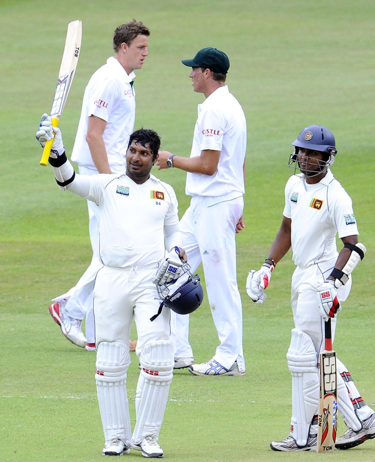 Kumar Sangakkara celebrates his century as South Africa bowlers look on, South Africa v Sri Lanka, Durban, December, 28, 2011