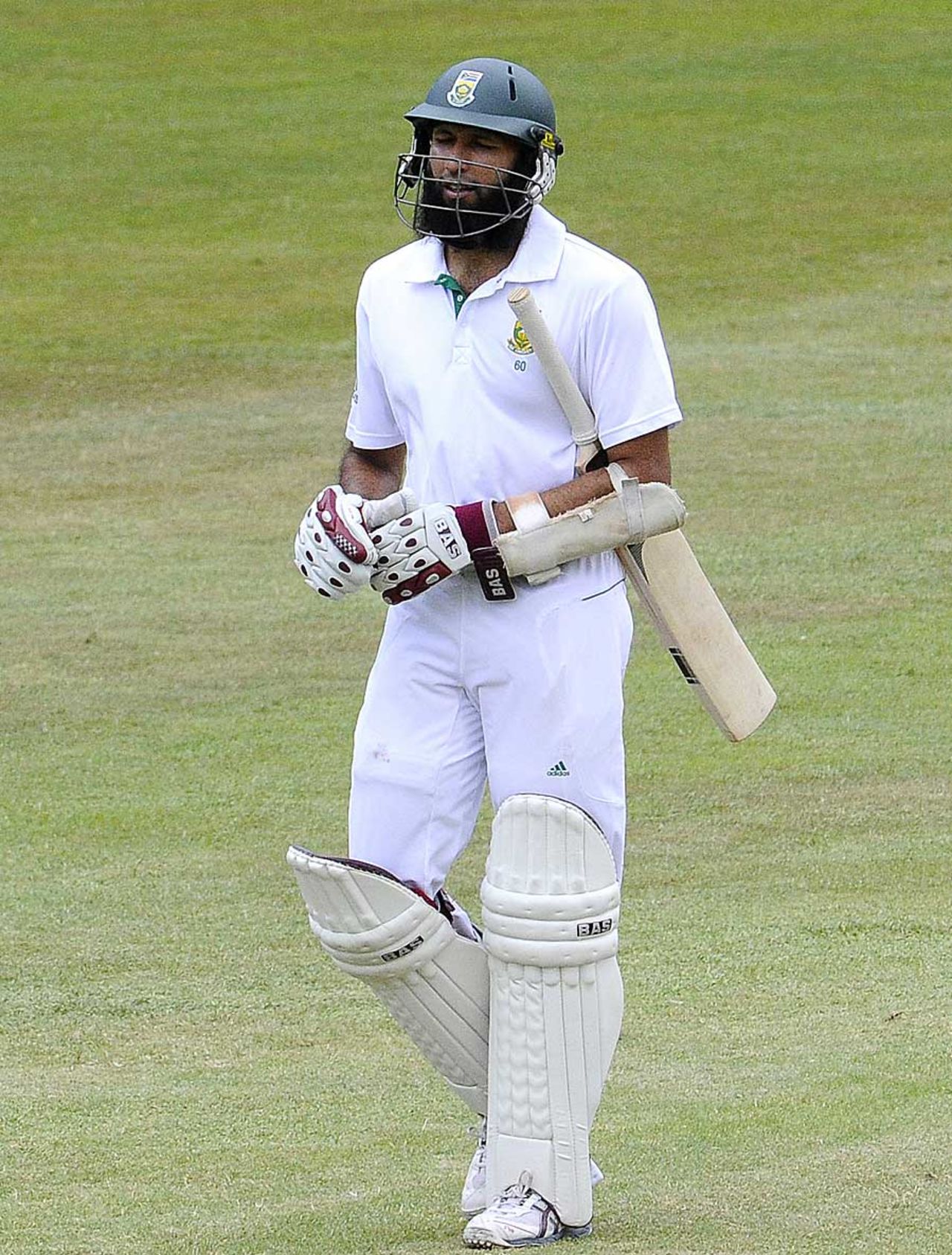 Hashim Amla walks back after being run out, South Africa v Sri Lanka, 2nd Test, Durban, 4th day, December 29, 2011