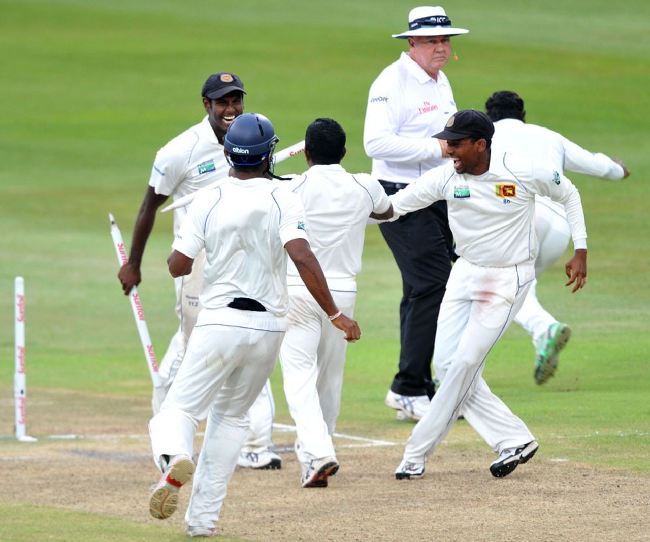 Sri Lanka's players celebrate their maiden Test win in South Africa, South Africa v Sri Lanka, 2nd Test, Durban, 4th day, December 29, 2011