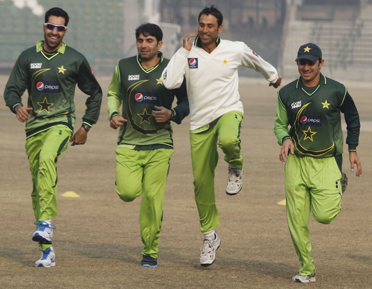 Umar Gul, Misbah-ul-Haq, Younis Khan and Saeed Ajmal go for a run during a training camp, Lahore, January 4, 2012