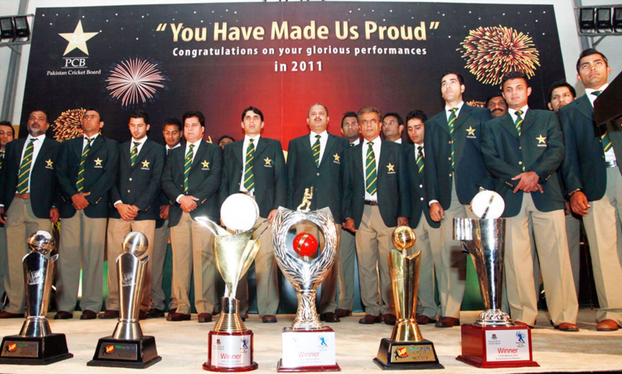The Pakistan team pose with the trophies they won in 2011, Lahore, January 6, 2012
