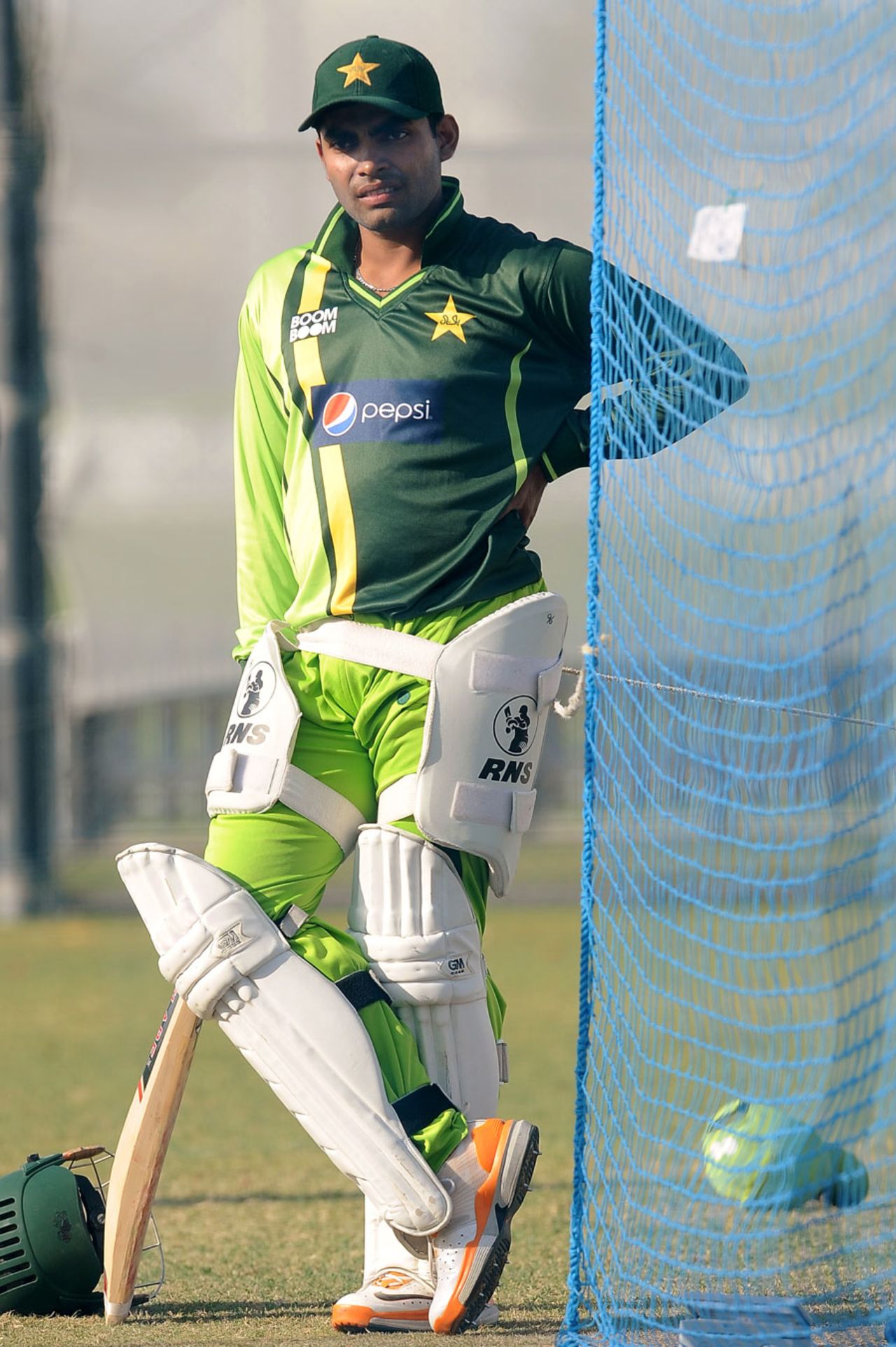 Umar Akmal waits to bat in the nets, Dubai, January 11, 2012