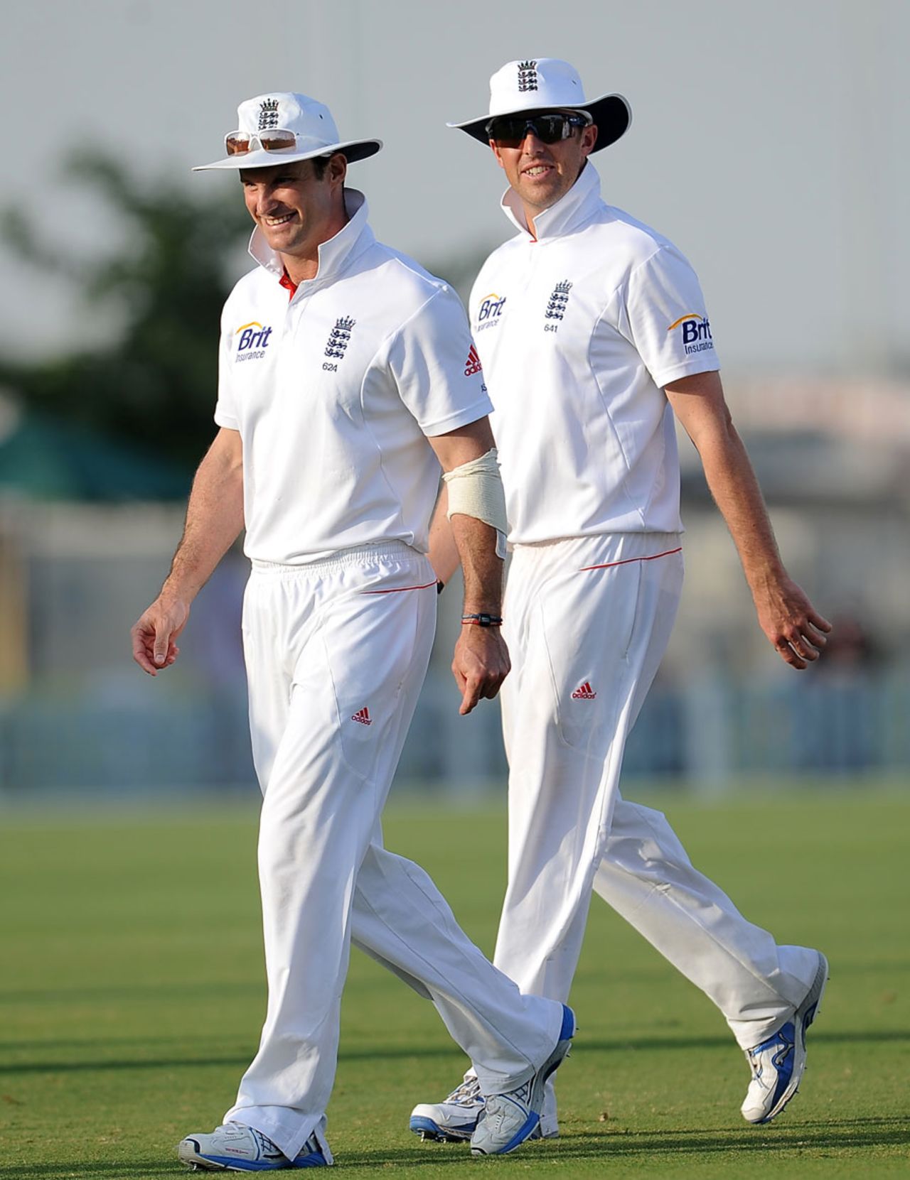Andrew Strauss (left) and Graeme Swann were pleased with England's second win, 3rd day, Dubai, January 13, 2012