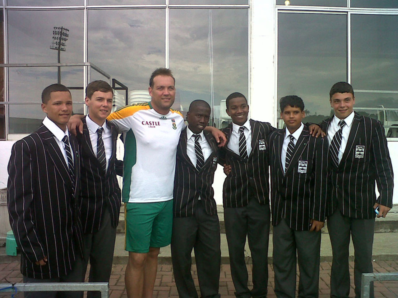 Jacques Kallis with students who have received scholarships from the Jacques Kallis Foundation, East London, January 13, 2012