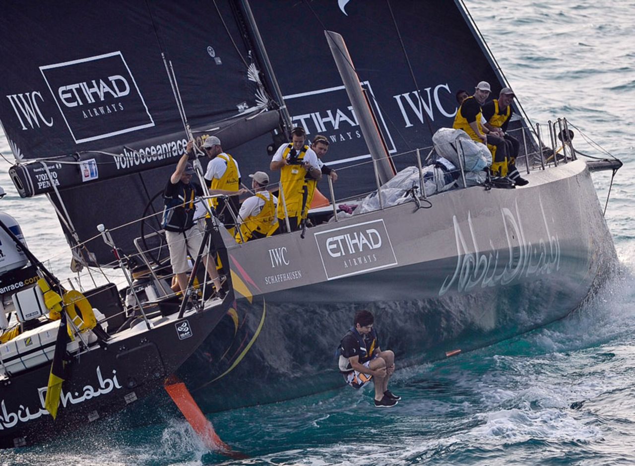 Alastair Cook bomb dives off the yacht of Abu Dhabi Ocean Racing departing the round the world race, Abu Dhabi, January 14, 2012