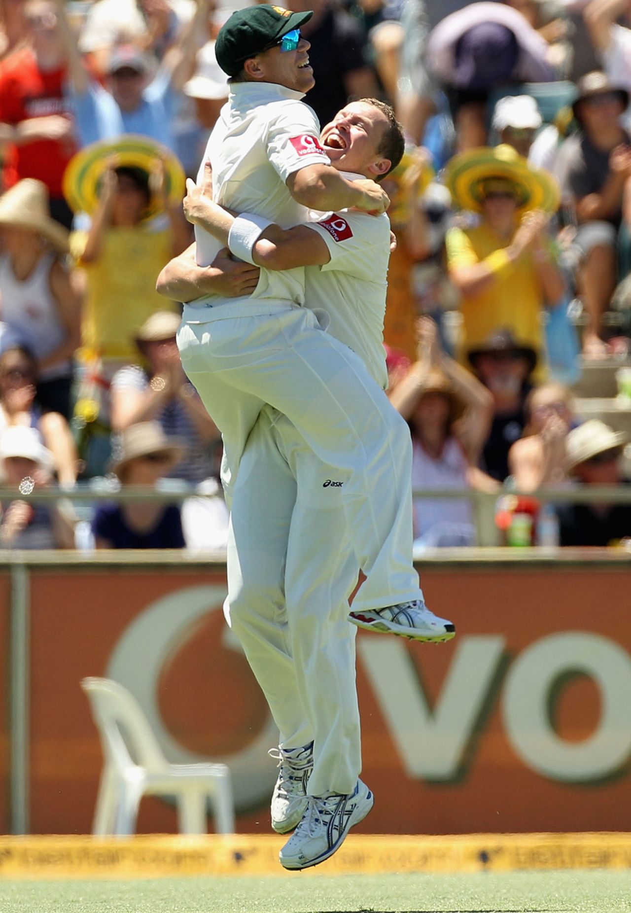 David Warner and Peter Siddle celebrate Australia's win, Australia v India, 3rd Test, Perth, 3rd day, January 15, 2012