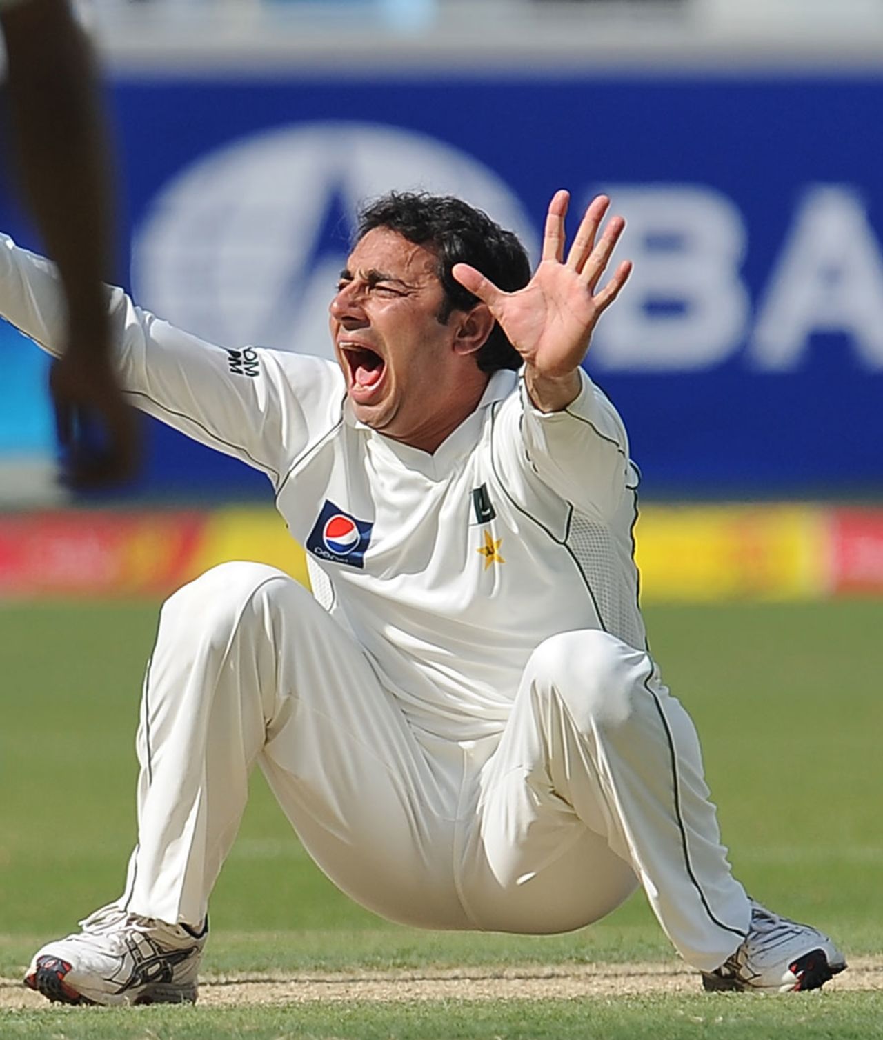 Saeed Ajmal appeals for a leg before decision against Eoin Morgan, Pakistan v England, 1st Test, Dubai, 1st day, January 17, 2012