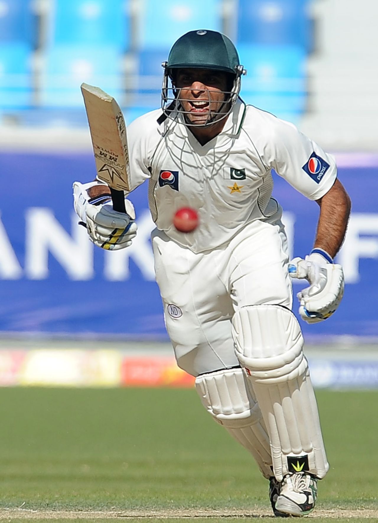 Taufeeq Umar made a half-century before being bowled by Stuart Broad, Pakistan v England, 1st Test, Dubai, 2nd day, January, 18, 2012