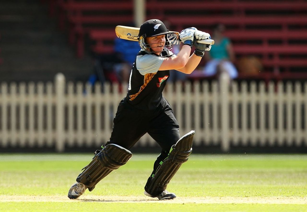 Debutant Katie Perkins drives through the off side, Australia v New Zealand, 1st Women's T20, North Sydney Oval, January 20, 2012