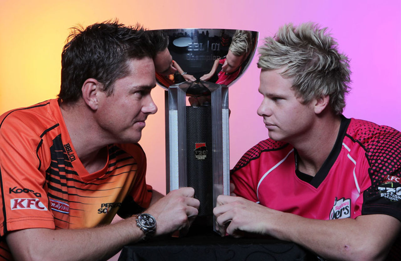 Opposing captains Marcus North and Steven Smith with the BBL trophy on the eve of the final, Perth, January 27, 2012