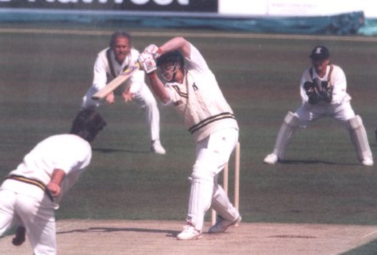 Larkins at slip, Scott behind the stumps, as Penney hits out.