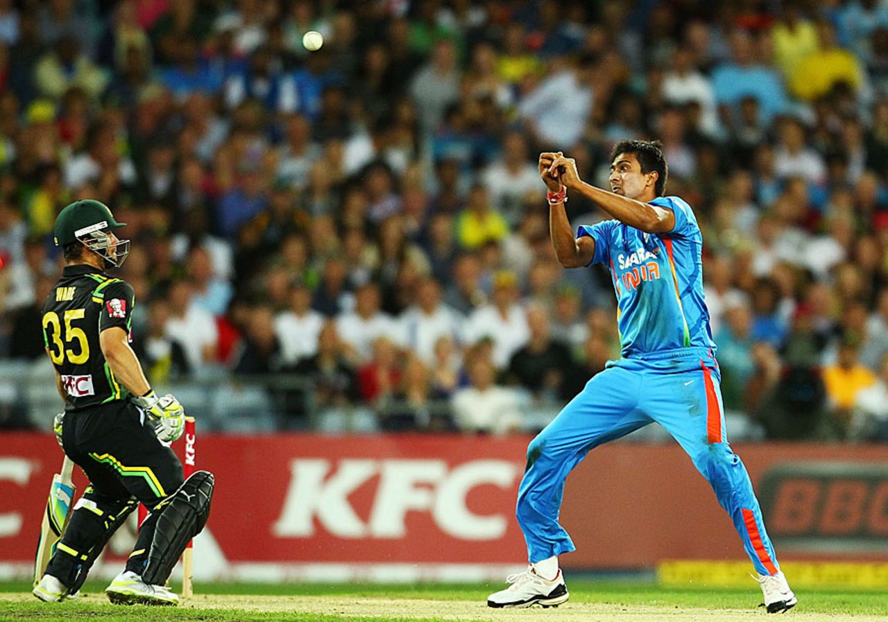 Rahul Sharma was left with a bloodied finger after attempting a return catch, Australia v India, 1st Twenty20, Stadium Australia, Sydney, February 1, 2012