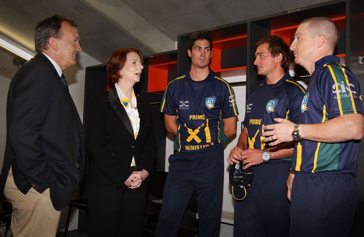 Australian Prime Minister Julia Gillard chats with Ben Cutting, Peter Forrest and Brad Haddin, Canberra, February 3, 2012
