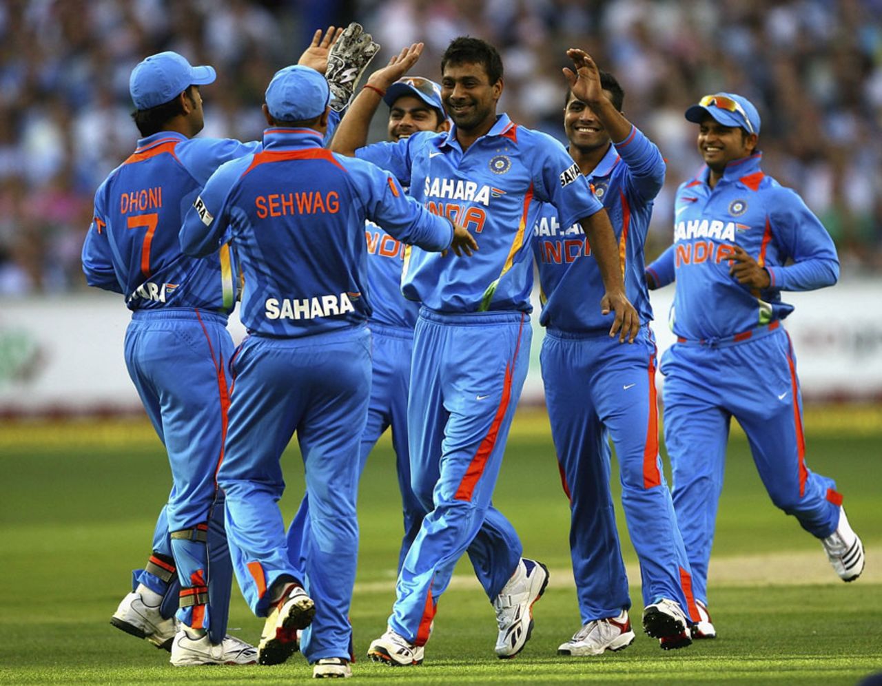 India get together after one of Praveen Kumar's strikes, Australia v India, 2nd T20I, Melbourne, February 3, 2012