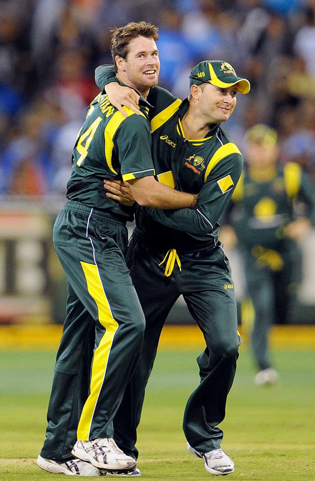 Daniel Christian and Michael Clarke celebrate the fall of Suresh Raina, Australia v India, CB Series, 1st ODI, Melbourne, February 5, 2012