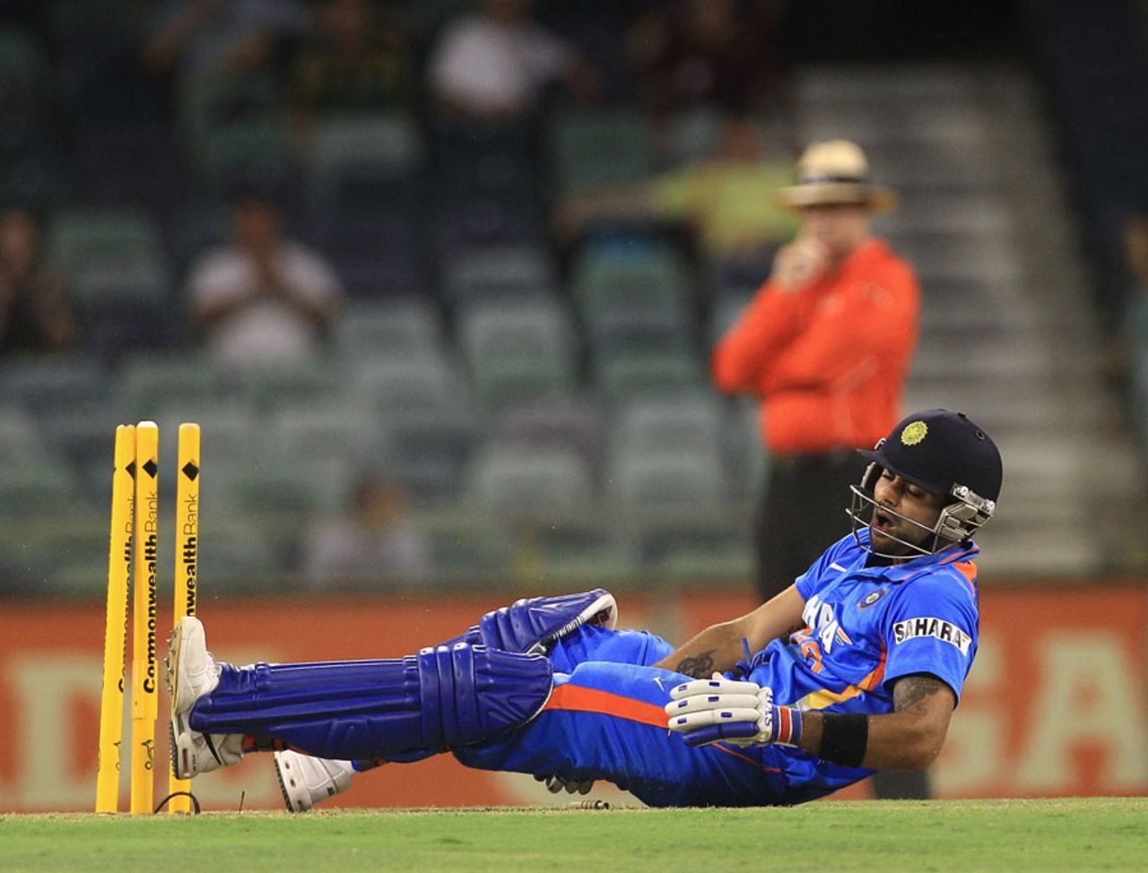 Virat Kohli goes down with a bout of cramps even as he is run out, India v Sri Lanka, CB Series, 2nd ODI, Perth, February 8, 2012