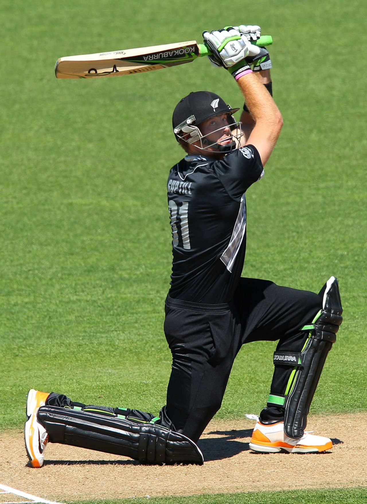 Martin Guptill launches the ball over the covers, New Zealand v Zimbabwe, 3rd ODI, Napier, February 9, 2012
