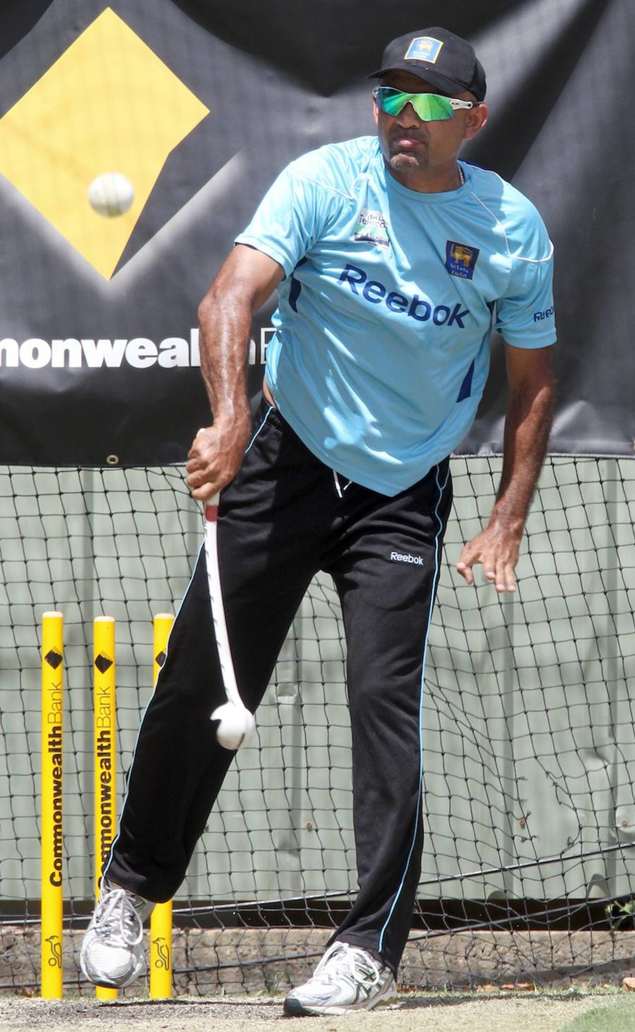 Marvan Atapattu uses the dog thrower at a training session, Perth, February 9, 2012