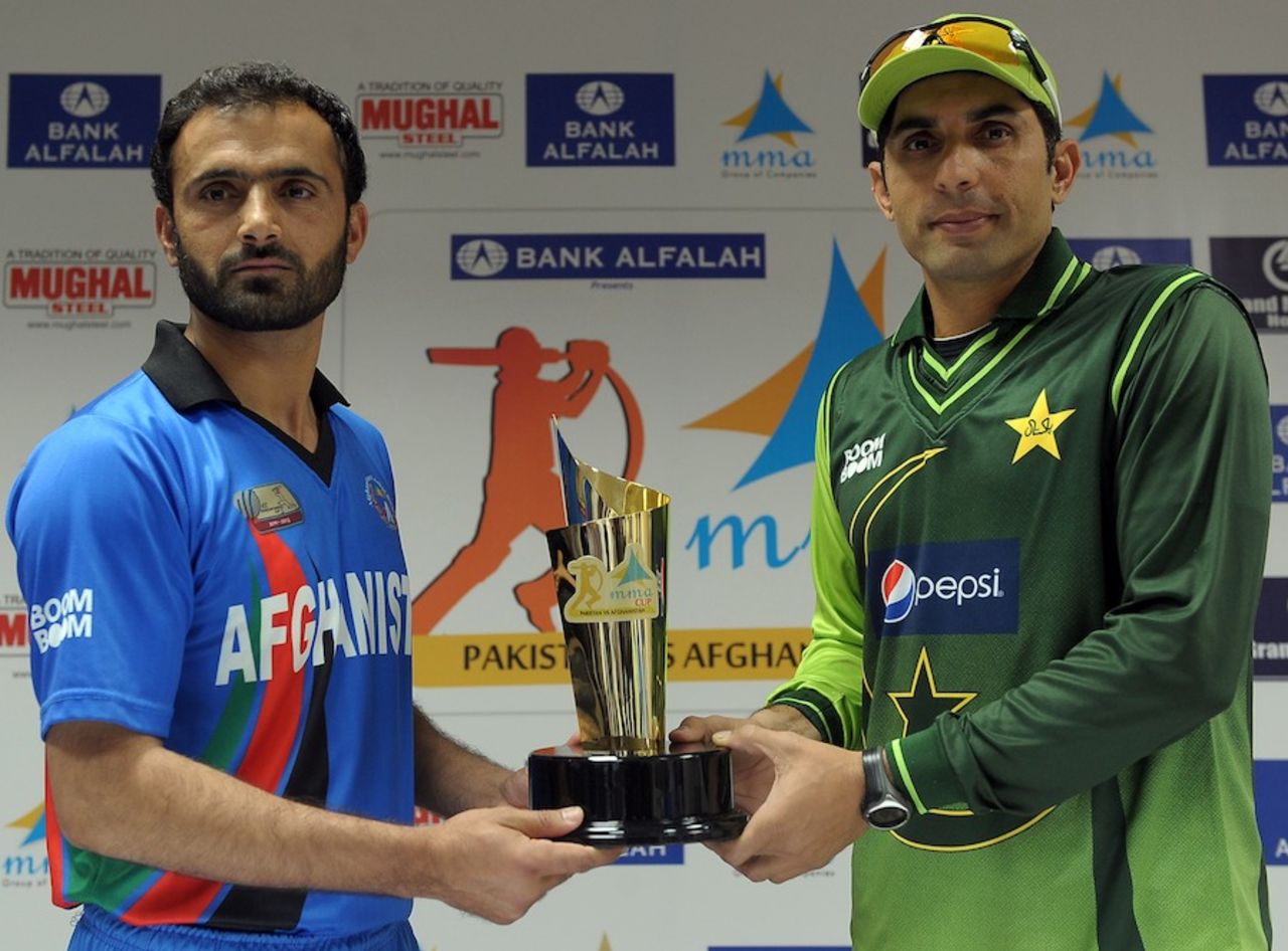 Nawroz Mangal and Misbah-ul-Haq with the trophy for the one-off ODI between Pakistan and Afghanistan, Sharjah, February 9, 2012