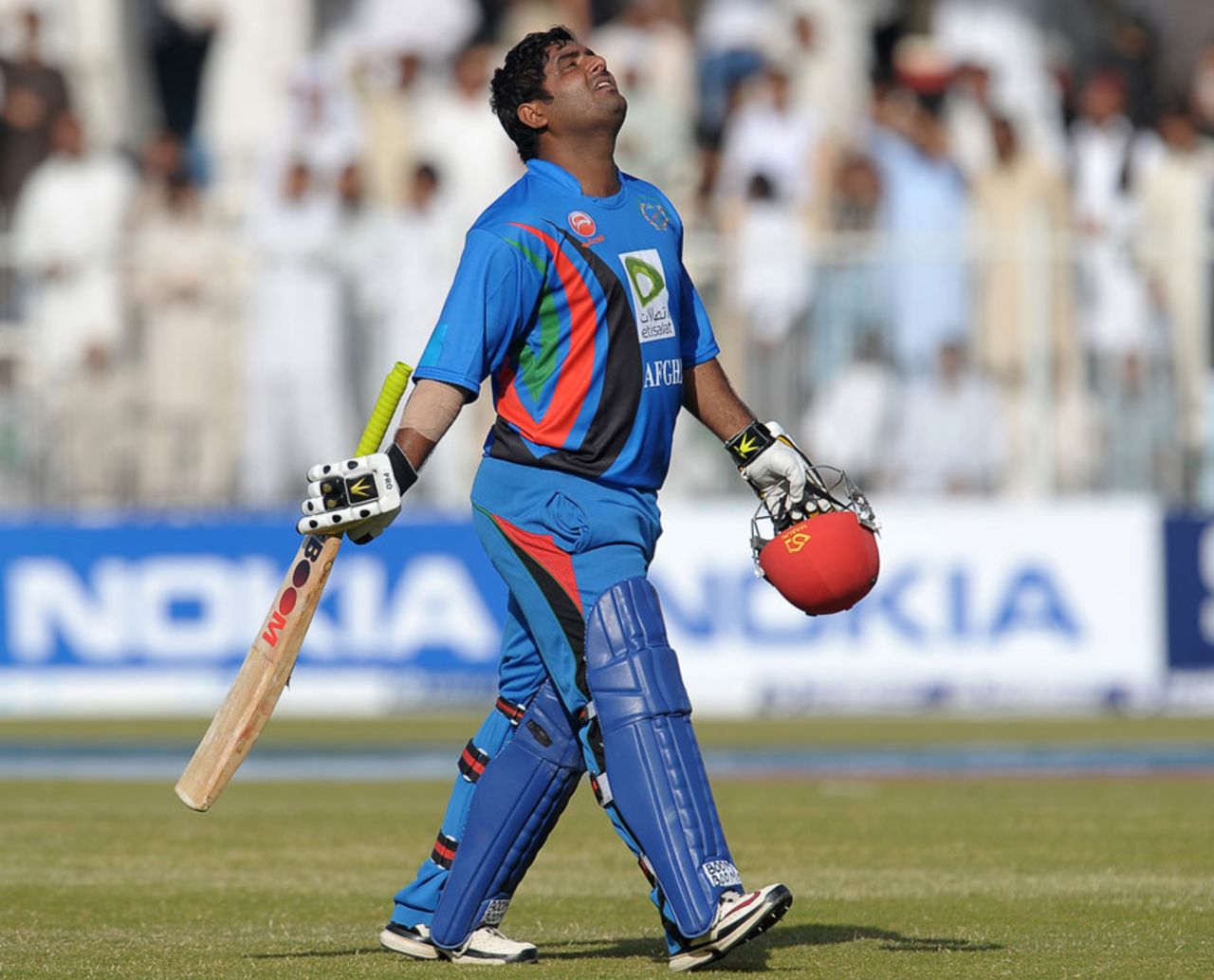 Mohammad Shahzad walks back dejected after falling to Shahid Afridi, Afghanistan v Pakistan, one-off ODI, Sharjah, February 10, 2012