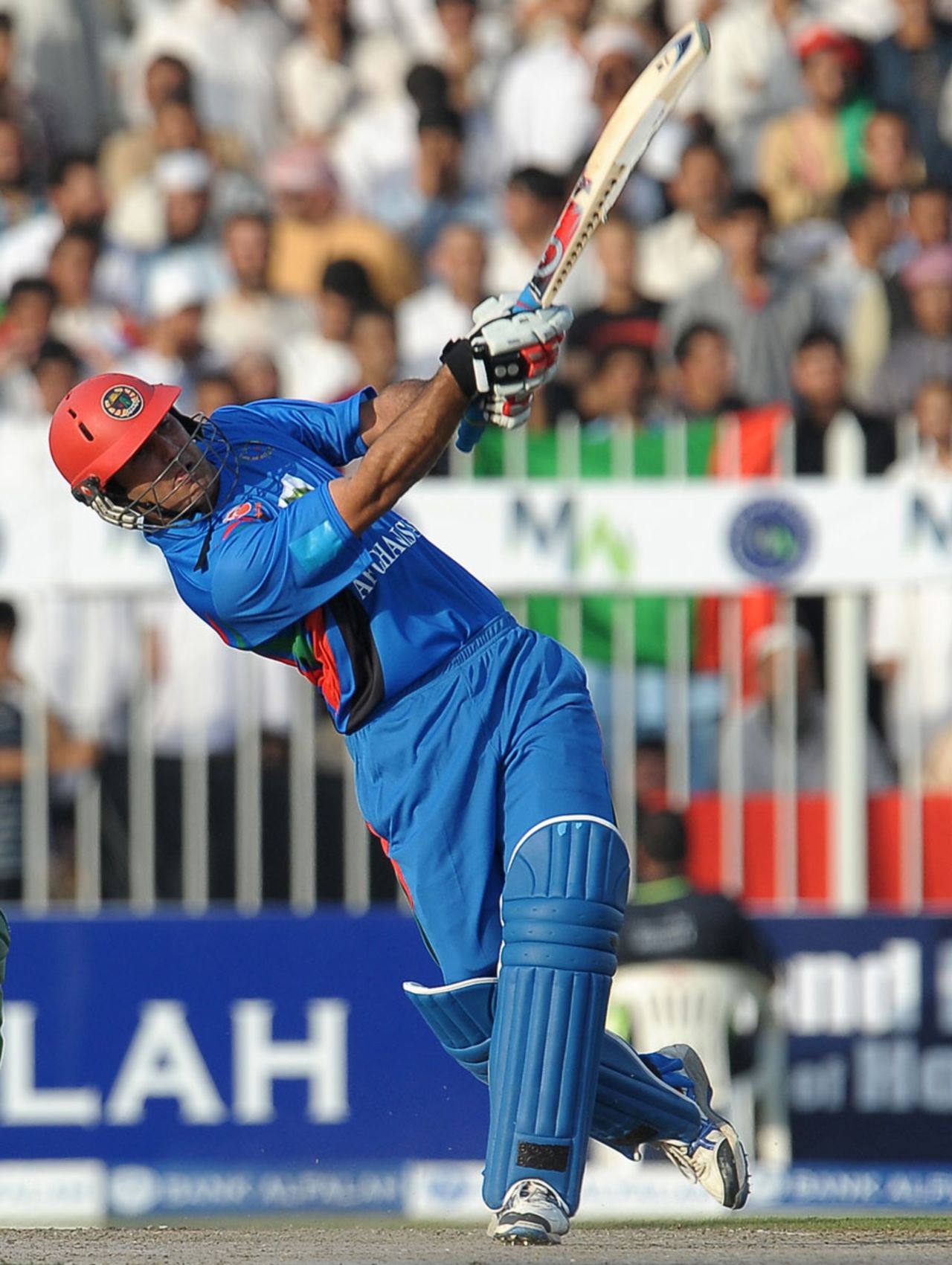 Mohammad Nabi tees off over the leg side, Afghanistan v Pakistan, one-off ODI, Sharjah, February 10, 2012
