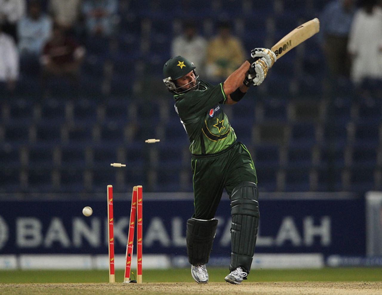 Shahid Afridi swings and misses at James Anderson, Pakistan v England, 2nd ODI, Abu Dhabi, February 15, 2012