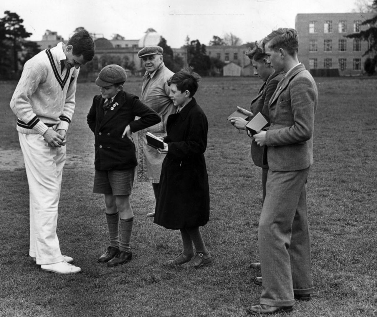 Clive van Ryneveld signs autographs for youngsters during a tour match against Oxford, Oxford University v South Africans, May 23, 1951