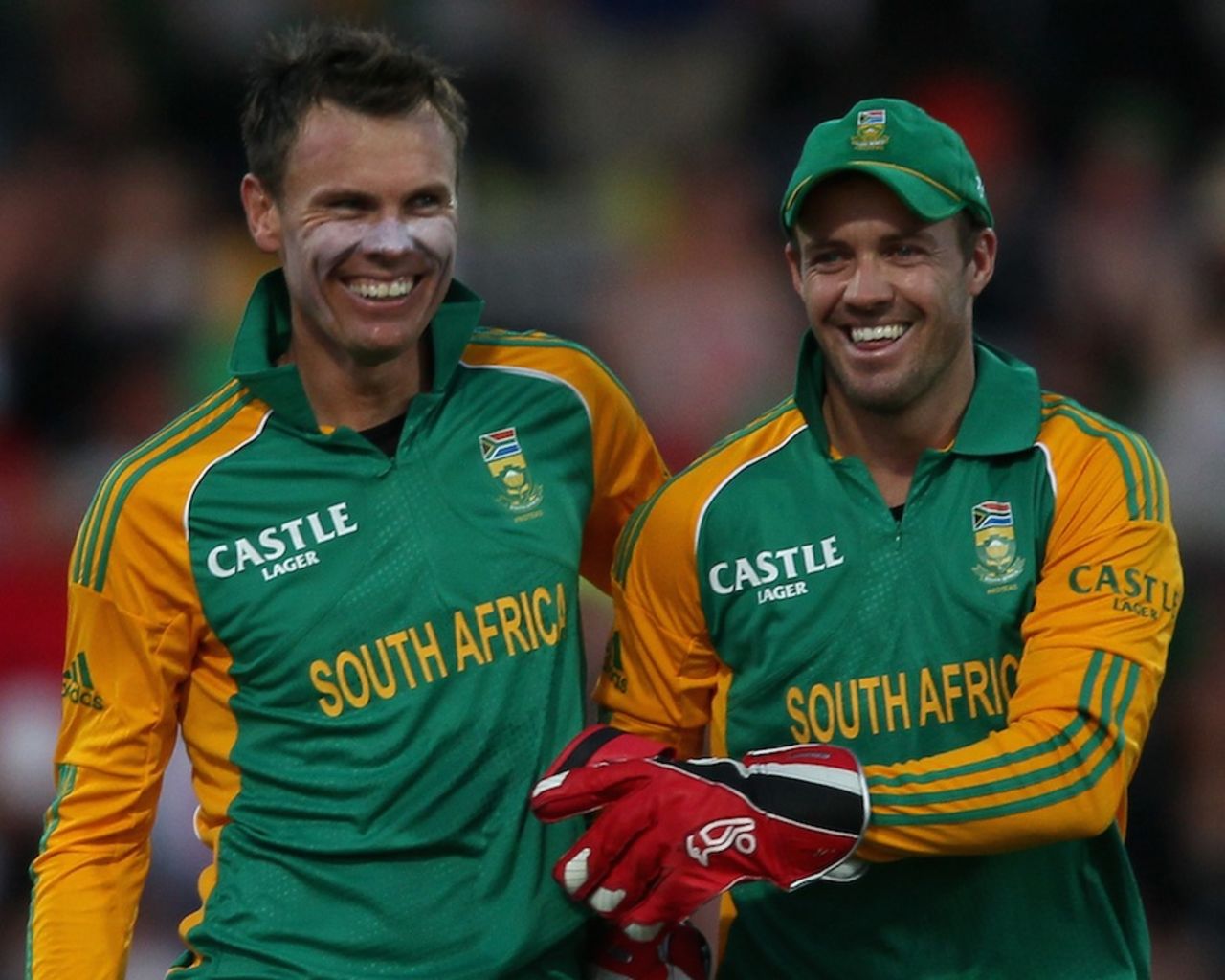 Johan Botha and AB de Villiers celebrate a wicket, New Zealand v South Africa, 2nd Twenty20 international, Hamilton, February 19, 2012