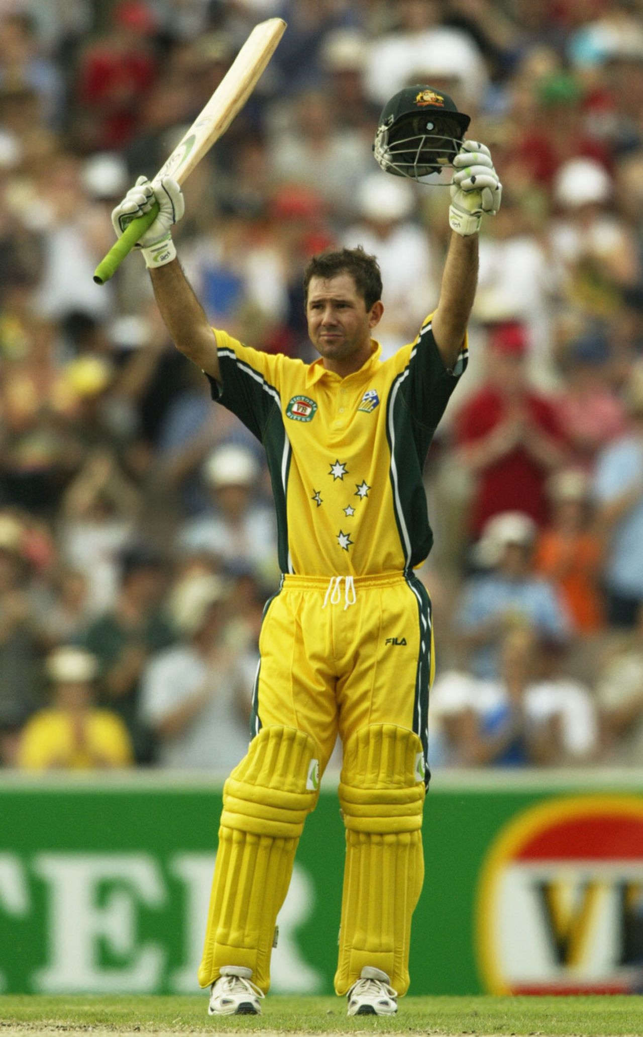 MELBOURNE - DECEMBER 15: Ricky Ponting raises his arms after reaching his century in the One Day International match between Australia and England at the Melbourne Cricket Ground in Melbourne, Australia on December 15, 2002.