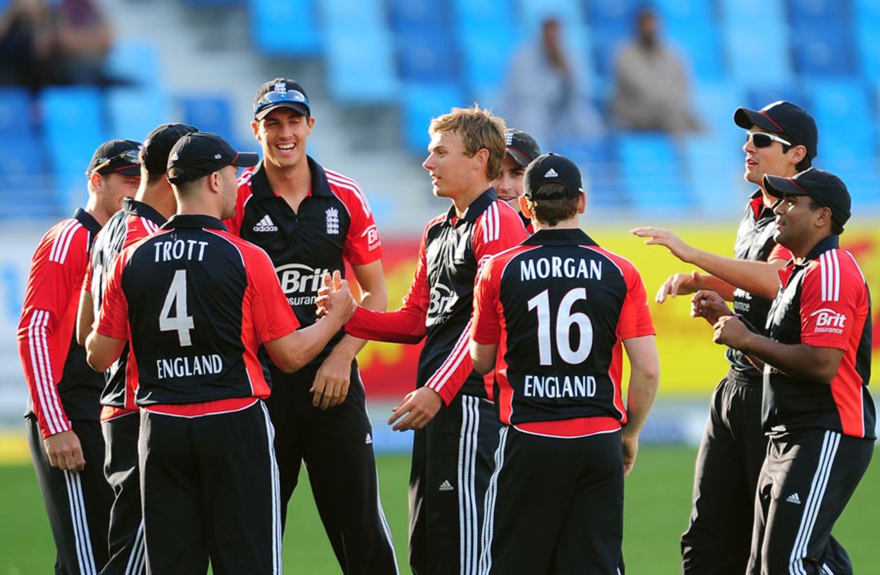 England players congratulate Danny Briggs on his maiden ODI wicket, Pakistan v England, 4th ODI, Dubai, February 21, 2012