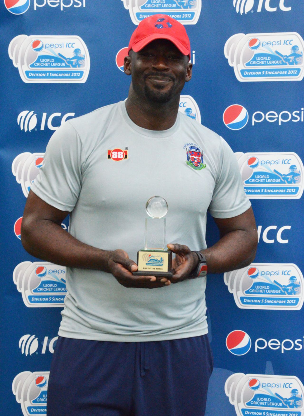 Ryan Bovell with the Man-of-the-Match award for his 5 for 9, Argentina v Cayman Islands, ICC WCL Division Five, Singapore, February 22, 2012