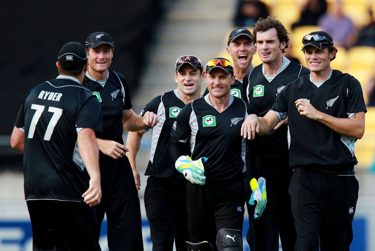 New Zealand gather around Jesse Ryder after he catches Graeme Smith, New Zealand v South Africa, 1st ODI , Wellington, February 25, 2012