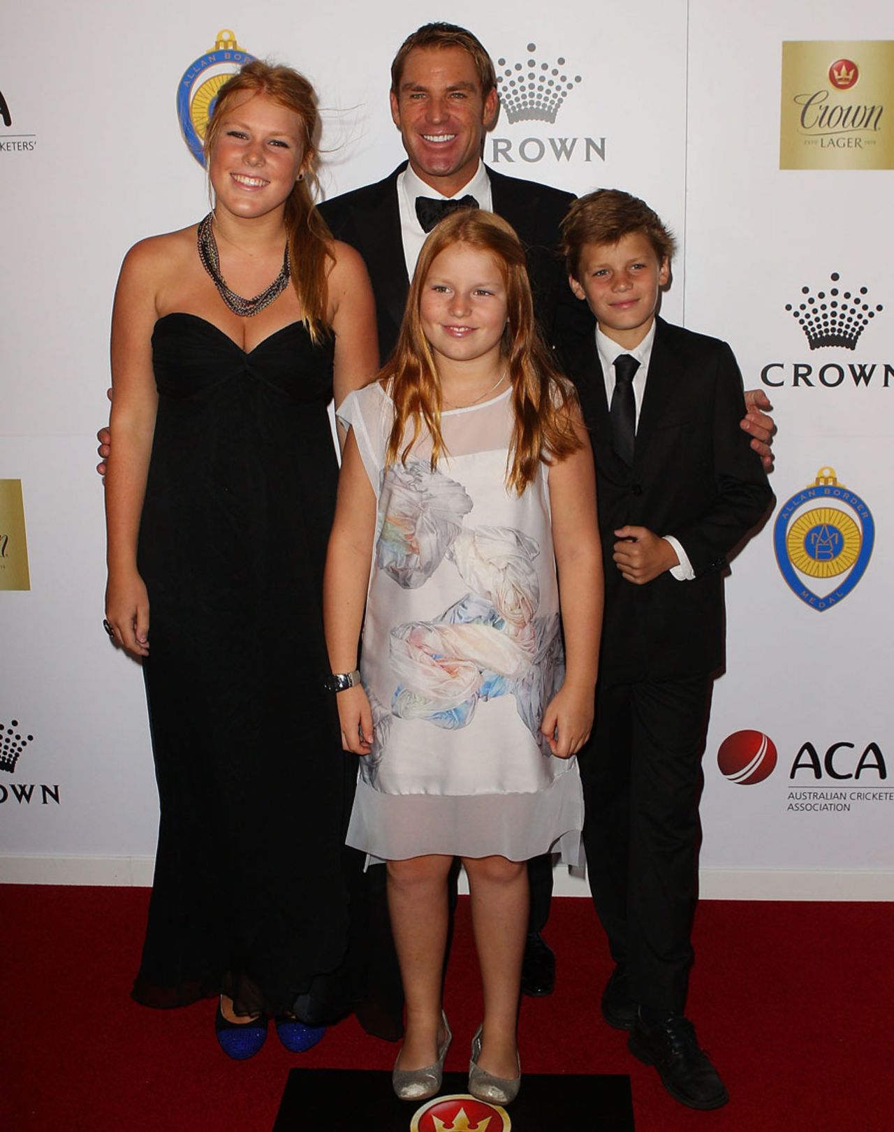 Shane Warne and his children at the Allan Border Medal awards, Melbourne, February 27, 2012 