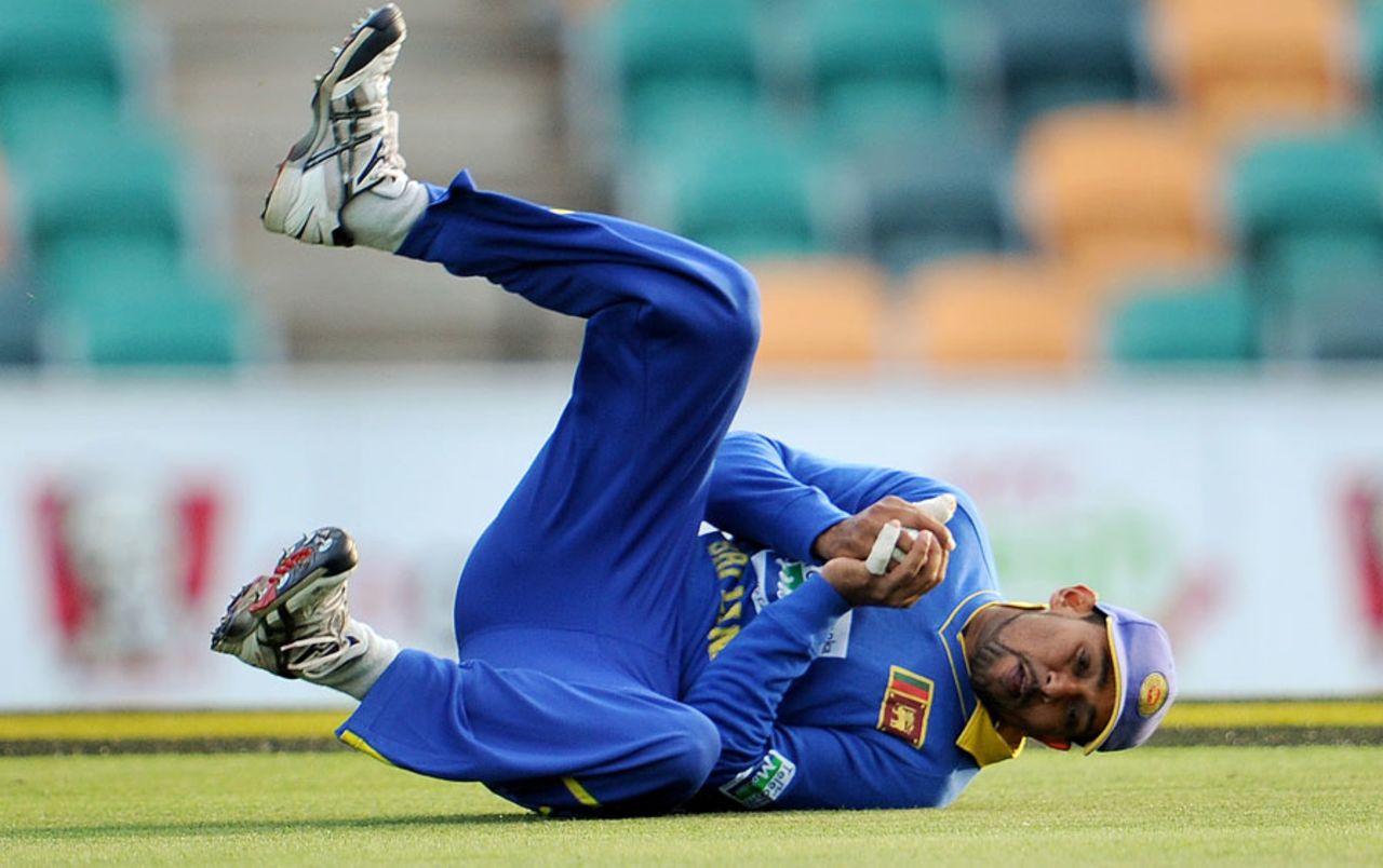 Tillakaratne Dilshan takes a catch to dismiss Virender Sehwag, India v Sri Lanka, CB series, Hobart, February 28, 2012