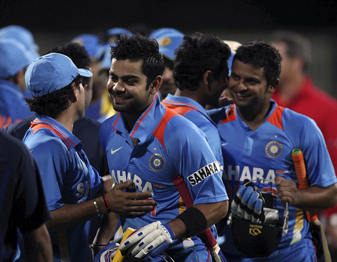 Virat Kohli is congratulated by team-mates after his blitz, India v Sri Lanka, CB series, Hobart, February 28, 2012