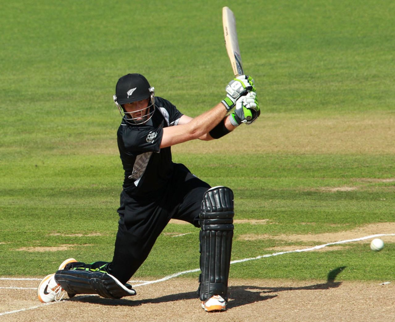 Martin Guptill gets on one knee to drive, New Zealand v South Africa, 2nd ODI, Napier, February 29, 2012 