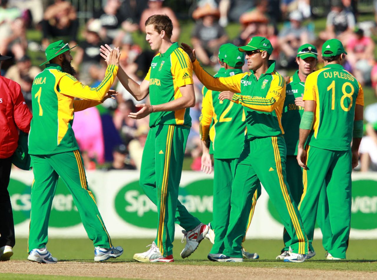 Morne Morkel gets a pat on the back after removing Tim Southee, New Zealand v South Africa, 2nd ODI, Napier, February 29, 2012 
