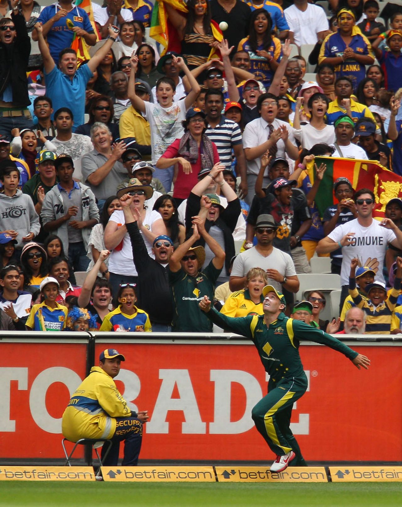 Michael Hussey is halfway through completing a spectacular catch, CB series, Melbourne, March 2, 2012