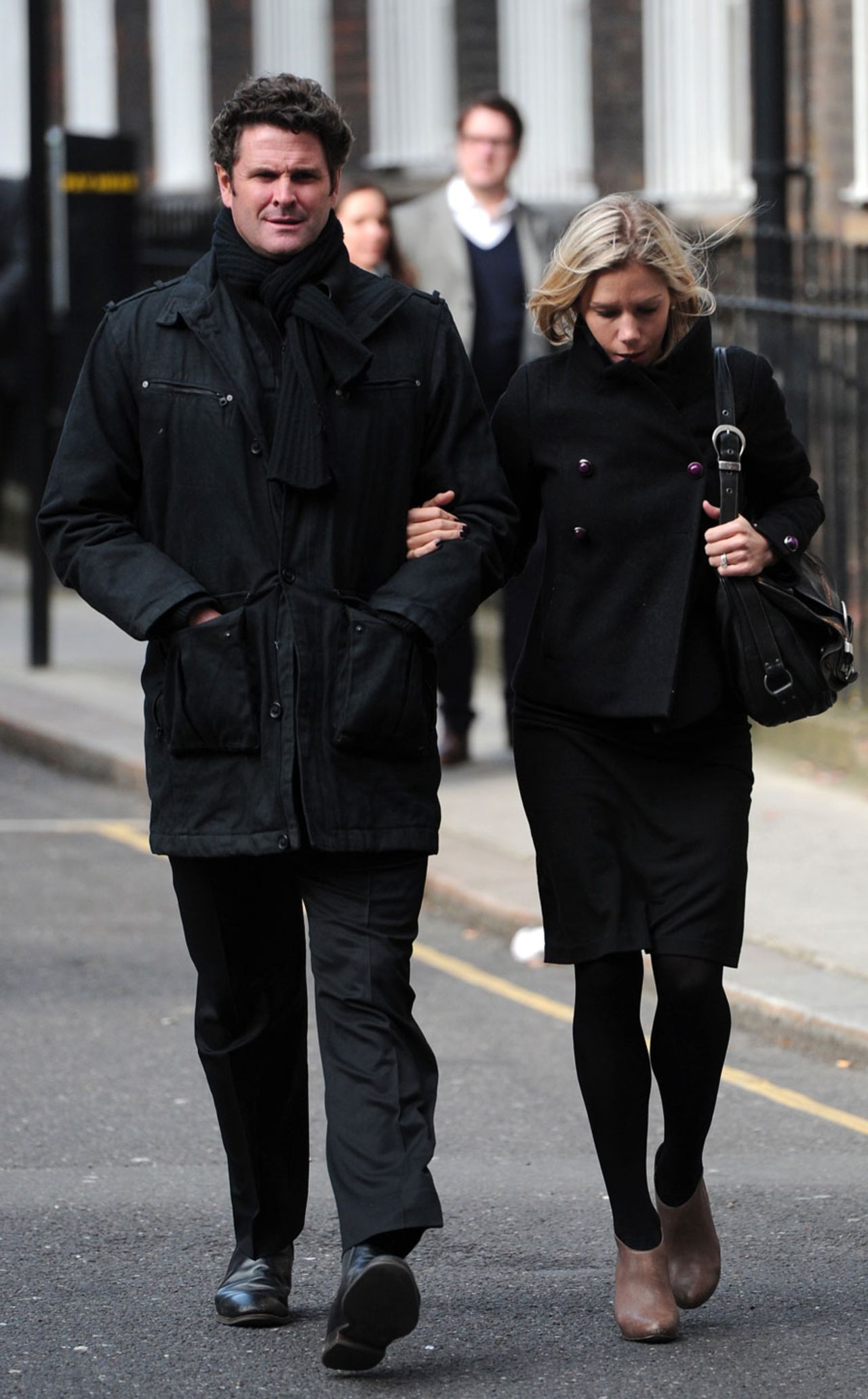 Chris Cairns and his wife outside the High Court in London, London, March 5, 2012