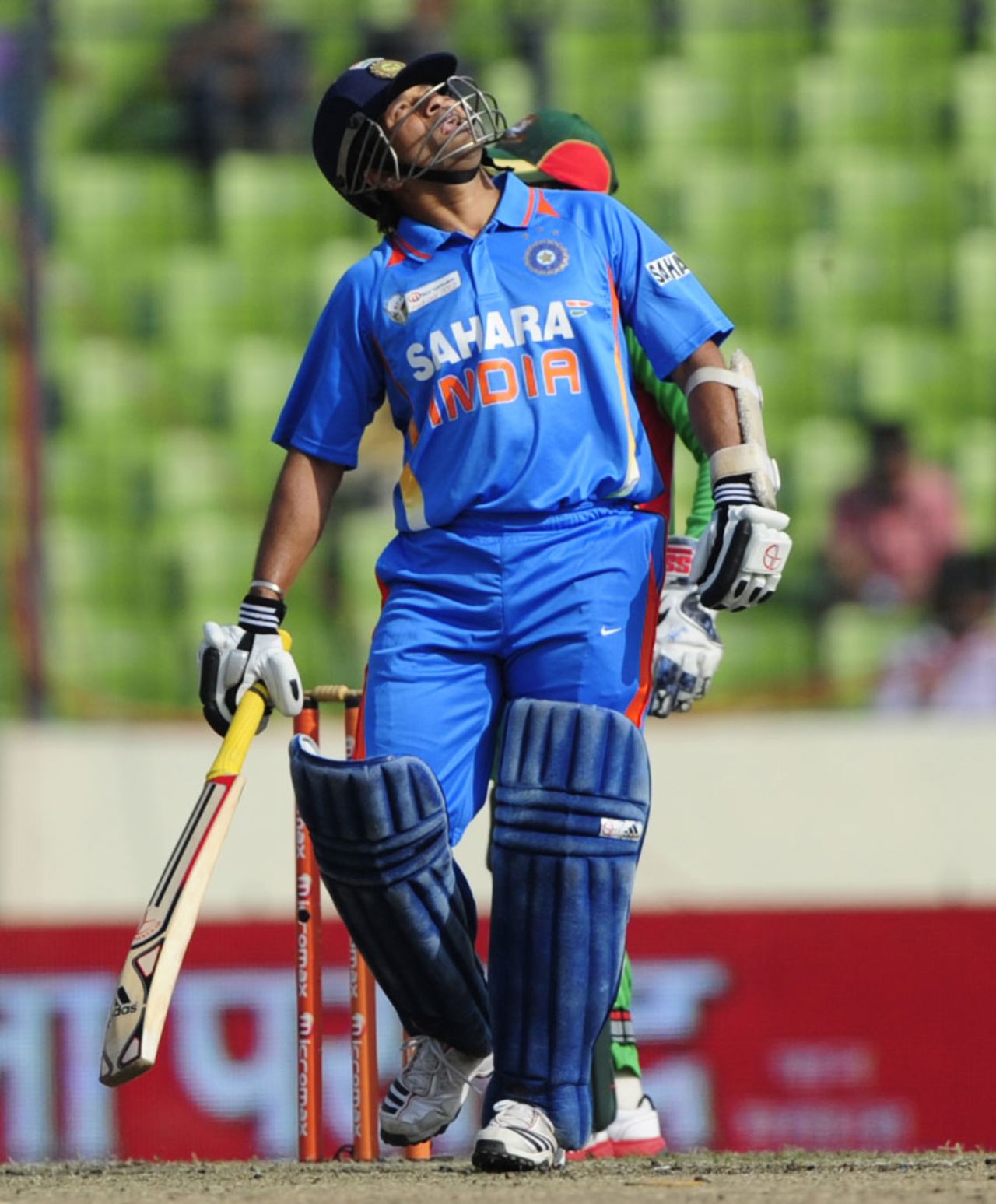 Sachin Tendulkar reacts to reaching his half-century, Bangladesh v India, Asia Cup, Mirpur, March 16, 2012