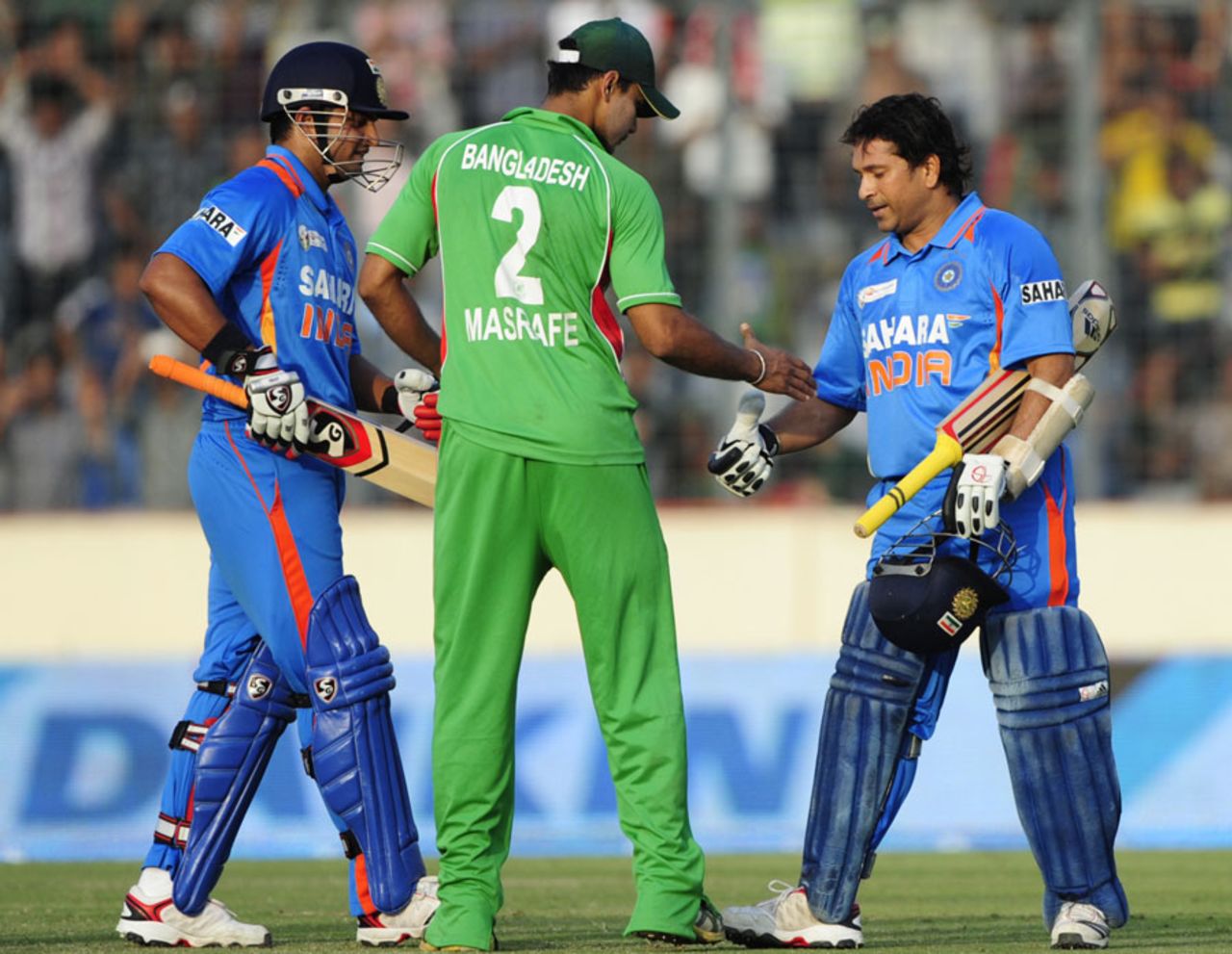 Sachin Tendulkar is congratulated by Mashrafe Mortaza on his 100th hundred, Bangladesh v India, Asia Cup, Mirpur, March 16, 2012