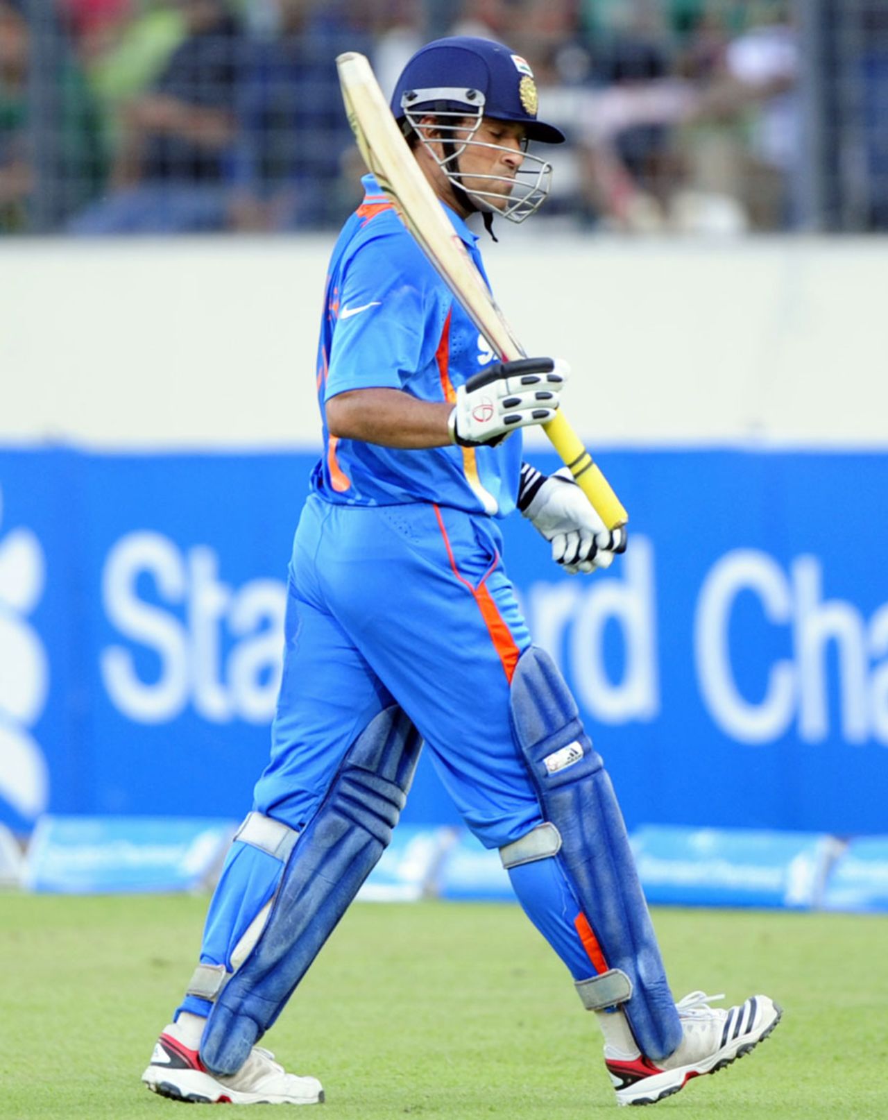 Sachin Tendulkar raises his bat as he walks off, Bangladesh v India, Asia Cup, Mirpur, March 16, 2012