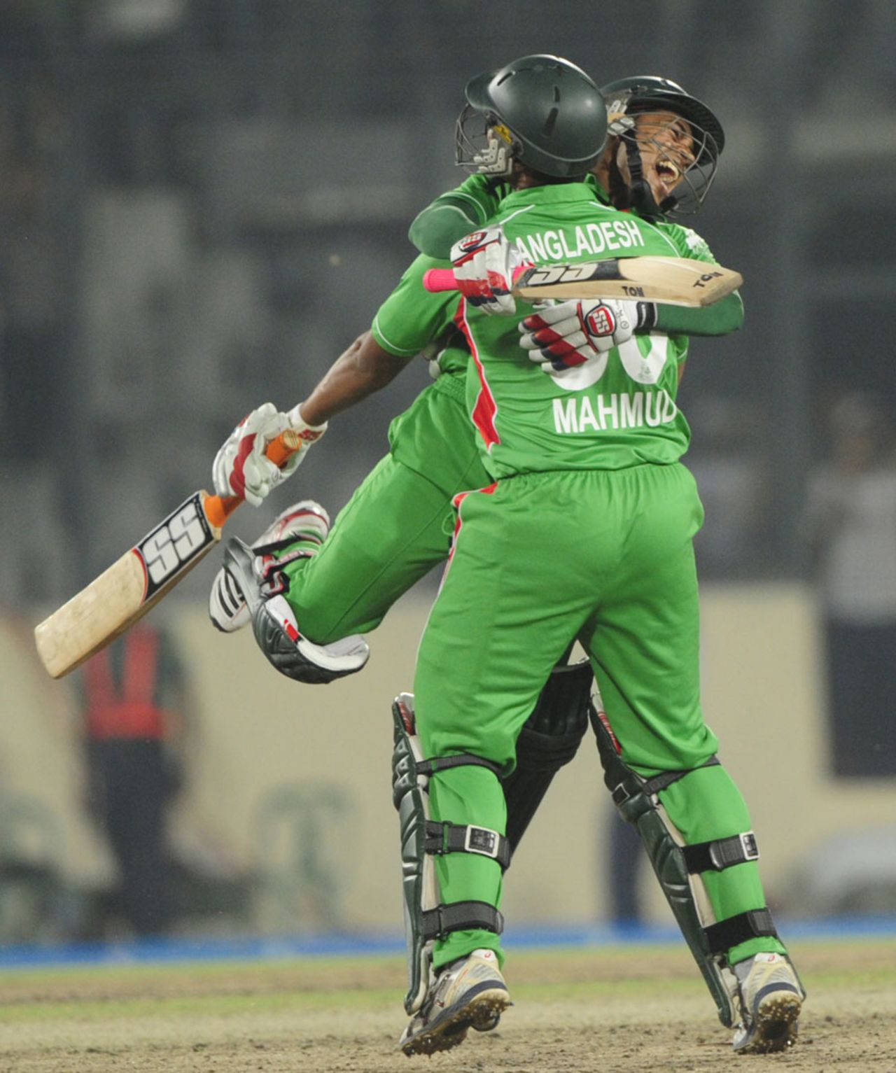 Mushfiqur Rahim jumps on Mahmudullah after Bangladesh's win, Bangladesh v India, Asia Cup, Mirpur, March 16, 2012