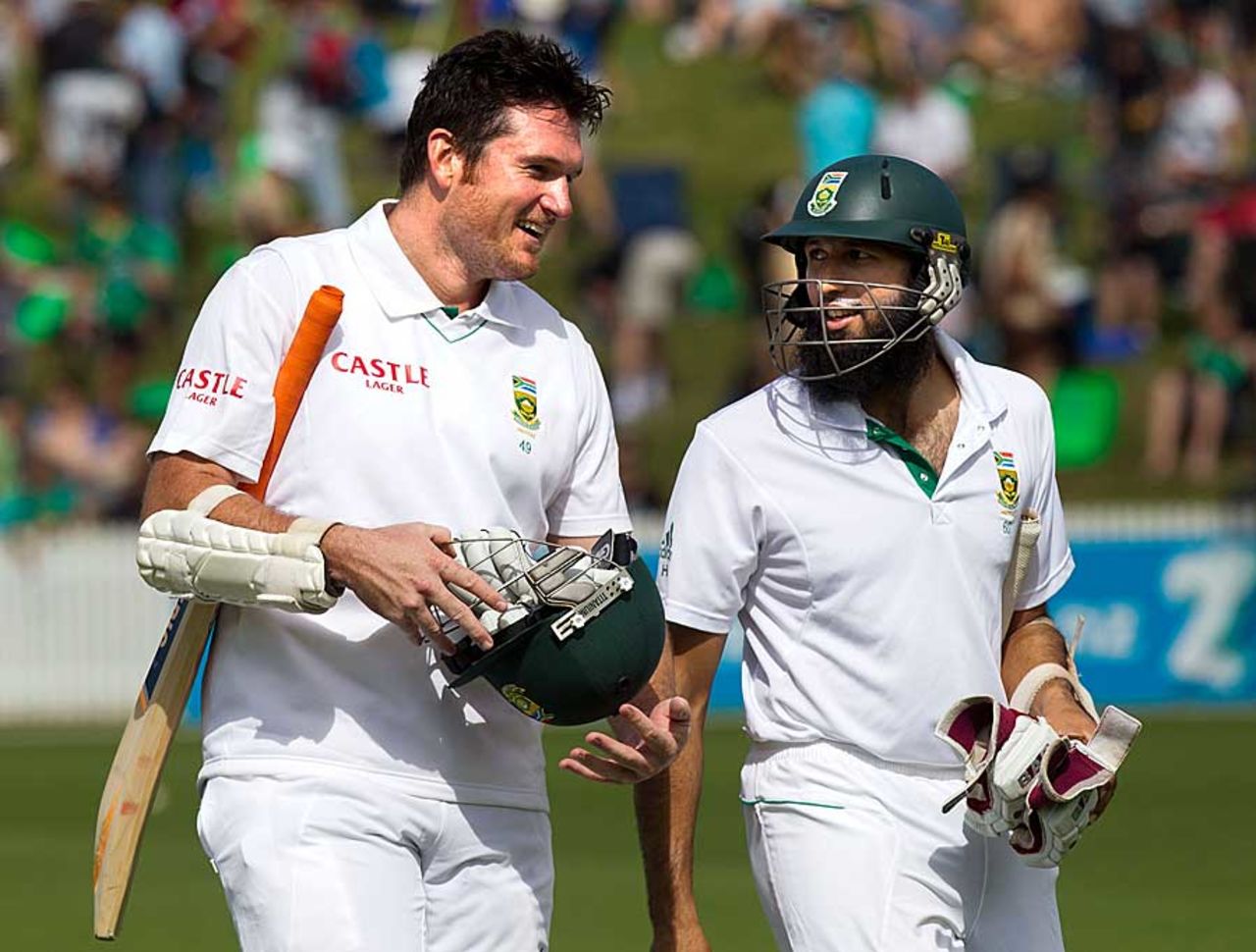 Graeme Smith walks back with Hashim Amla after taking his team to a win, New Zealand v South Africa, 2nd Test, Hamilton, 3rd day, March 17, 2012