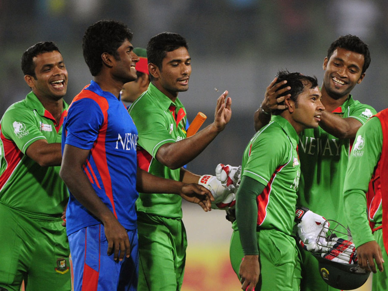 Bangladesh captain Mushfiqur Rahim is surrounded by his players after the win, Bangladesh v India, Asia Cup, Mirpur, March 16, 2012