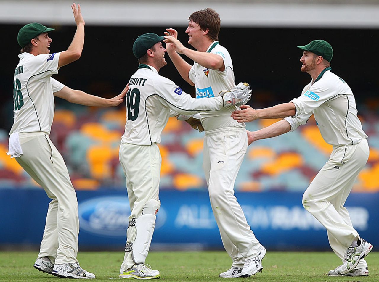 Tasmania celebrate a wicket, Queensland v Tasmania, Sheffield Shield Final, 2nd day, Brisbane, March 17 2012