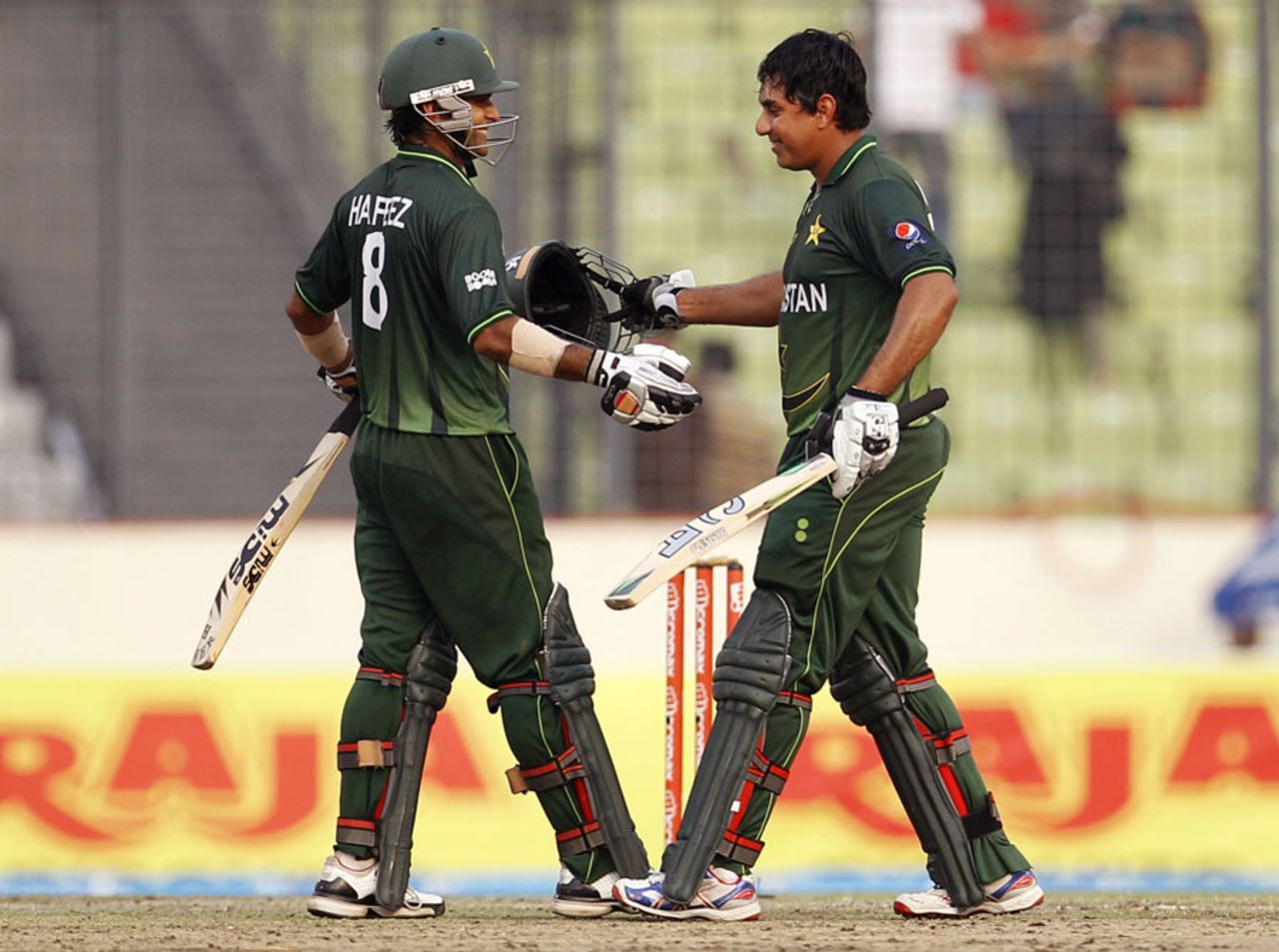 Mohammad Hafeez congratulates Nasir Jamshed on his century, India v Pakistan, Asia Cup, Mirpur, March 18, 2012