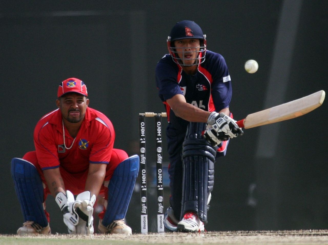 Paras Khadka reverse-sweeps during his half-century, Bermuda v Nepal, ICC World Twenty20 Qualifier, Abu Dhabi, March 18, 2012