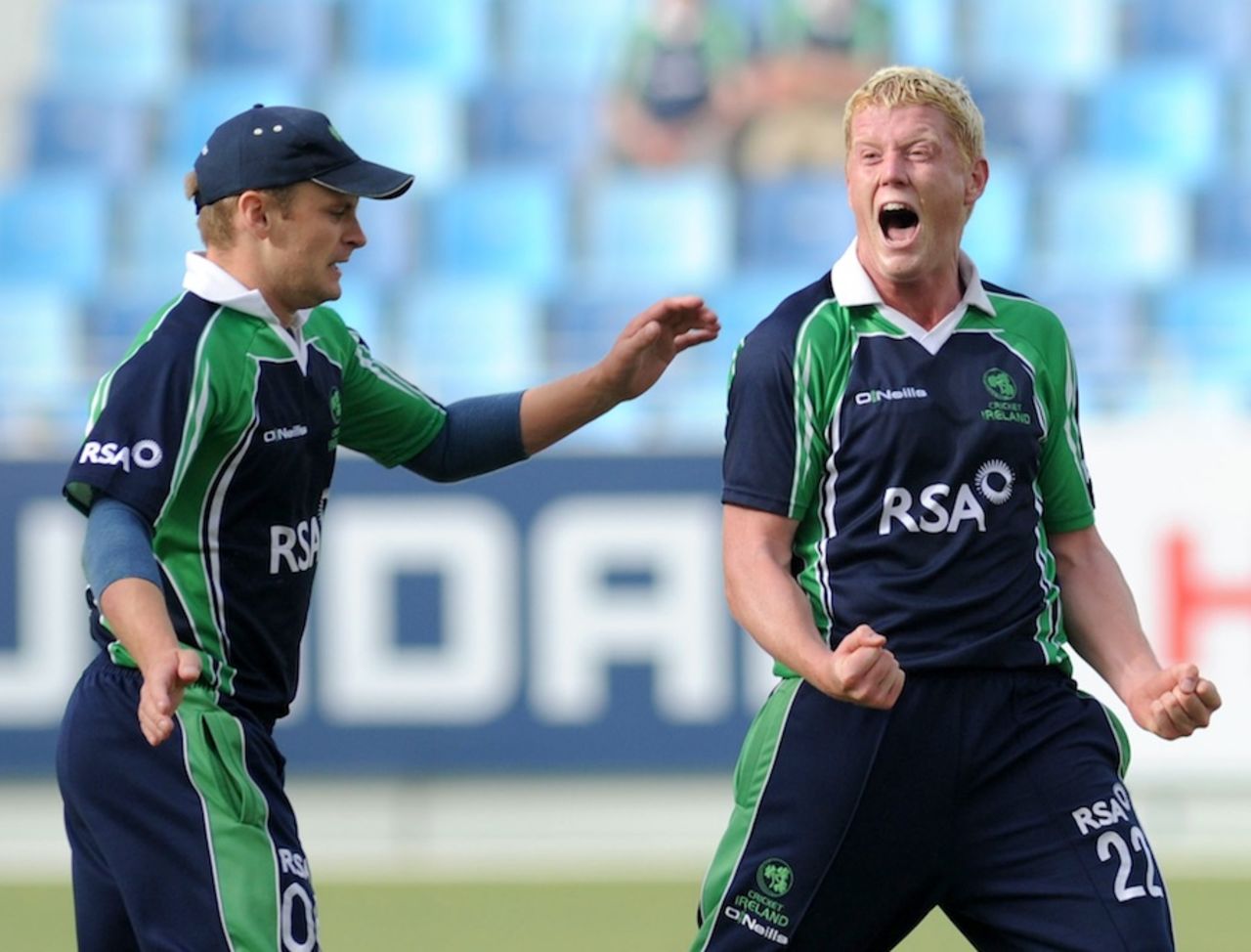 Kevin O'Brien and William Porterfield celebrate a wicket, Ireland v Scotland, ICC World Twenty20 Qualifier, Dubai, March 18, 2012