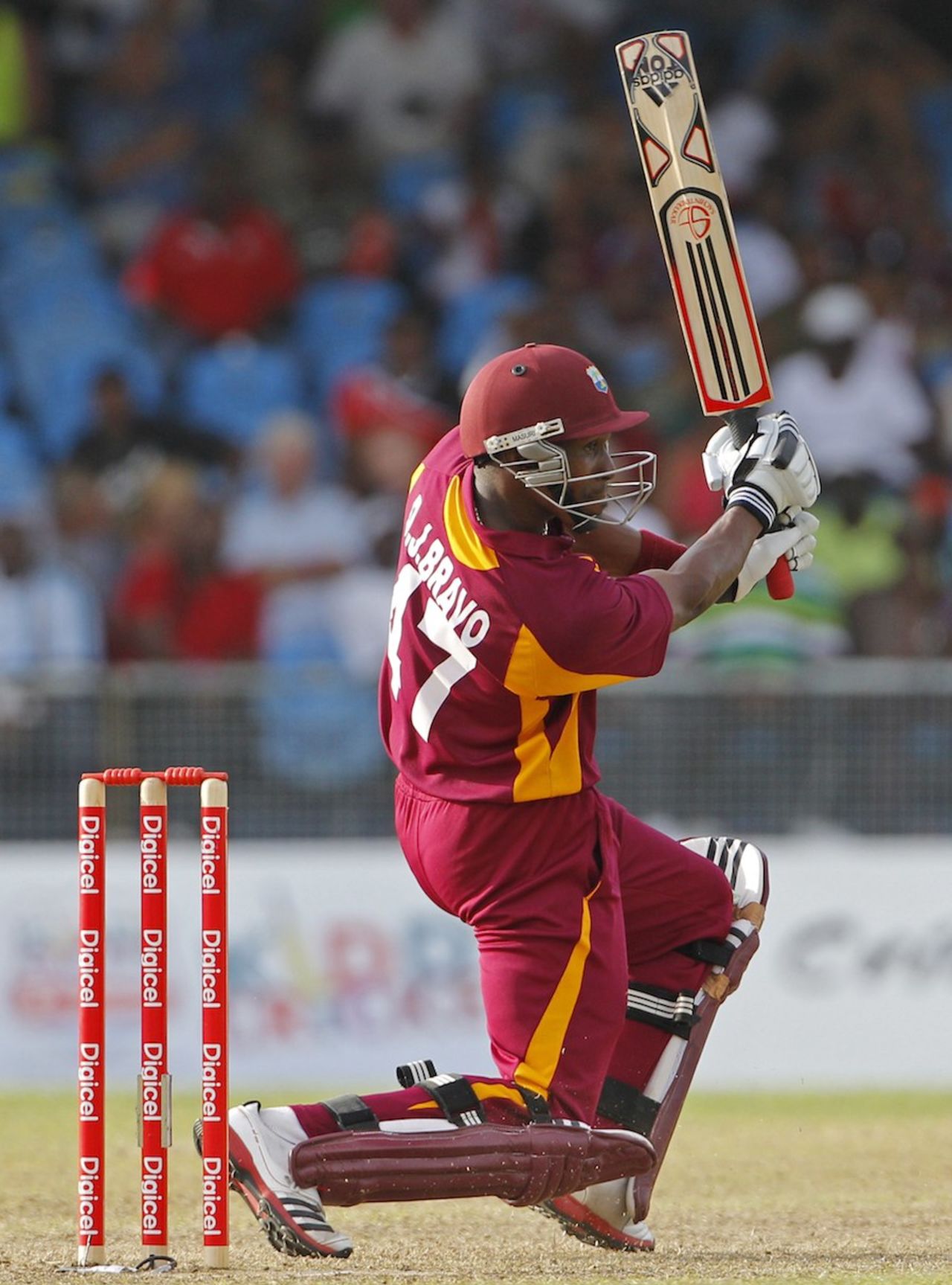 Dwayne Bravo drives during his innings of 30, West Indies v Australia, 2nd ODI, St Vincent, March 18, 2012